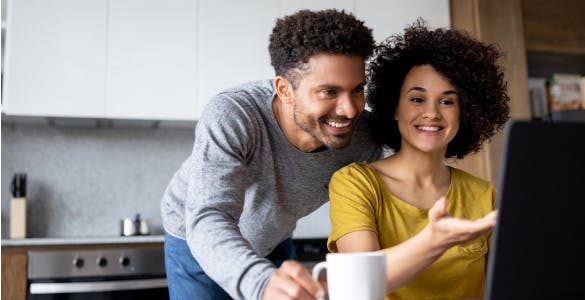 woman and man at computer with support specialist